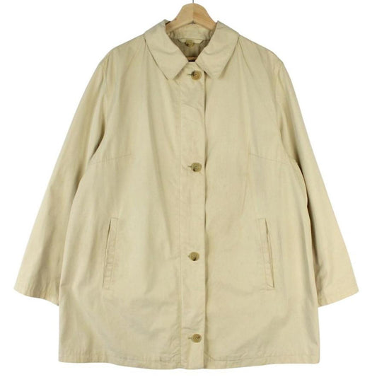 Burberry beige single breasted coat with logo detail and classic tailored design.