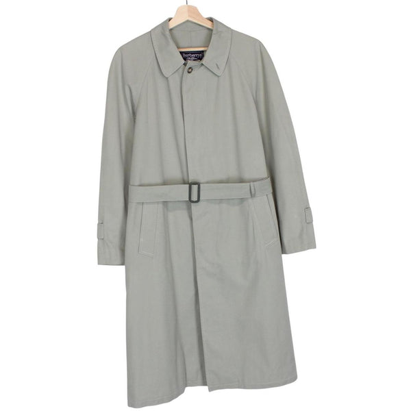 Burberry green trench coat with Nova Check pattern and single-breasted design.