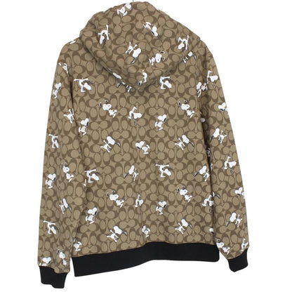 Coach brown hoodie featuring Peanuts Snoopy graphic and full zip design.
