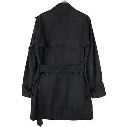 Aquascutum black trench coat with house check pattern and belted waist detail.