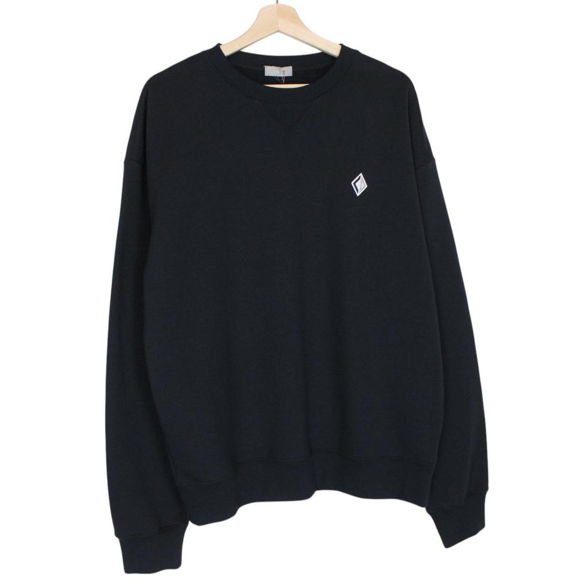 Dior navy blue sweatshirt featuring embroidered CD icon logo on cotton material.
