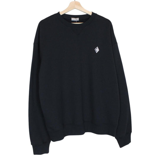 Dior navy blue sweatshirt featuring embroidered CD icon logo on cotton material.