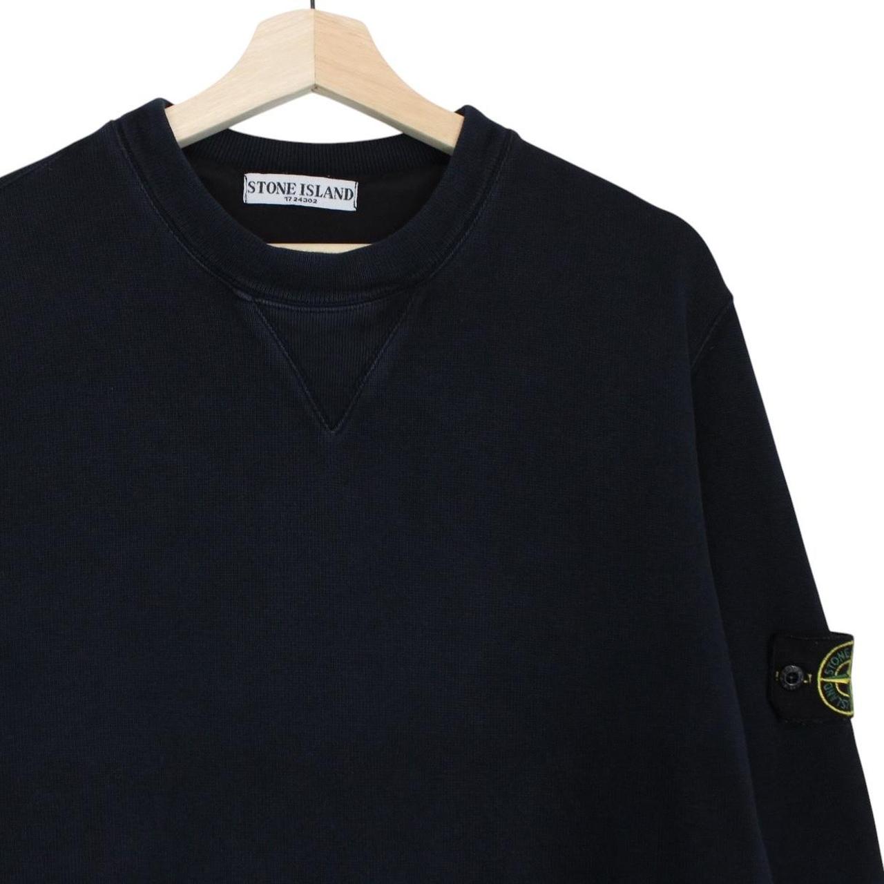 Stone Island navy blue cotton sweatshirt with logo patch and ribbed cuffs.