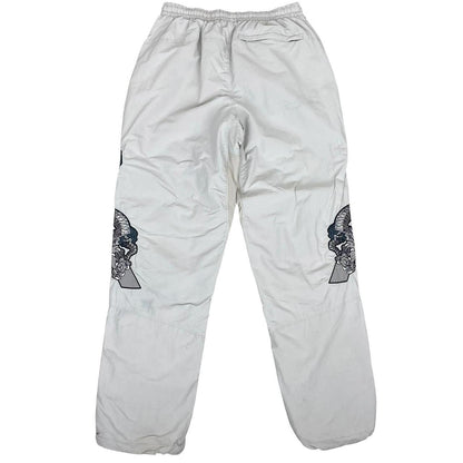 Palace grey joggers embroidered dragon design, made of nylon, size medium.