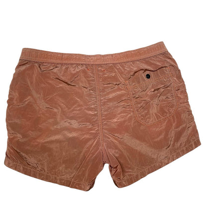 Stone Island orange swim shorts with logo patch and nylon metal material.