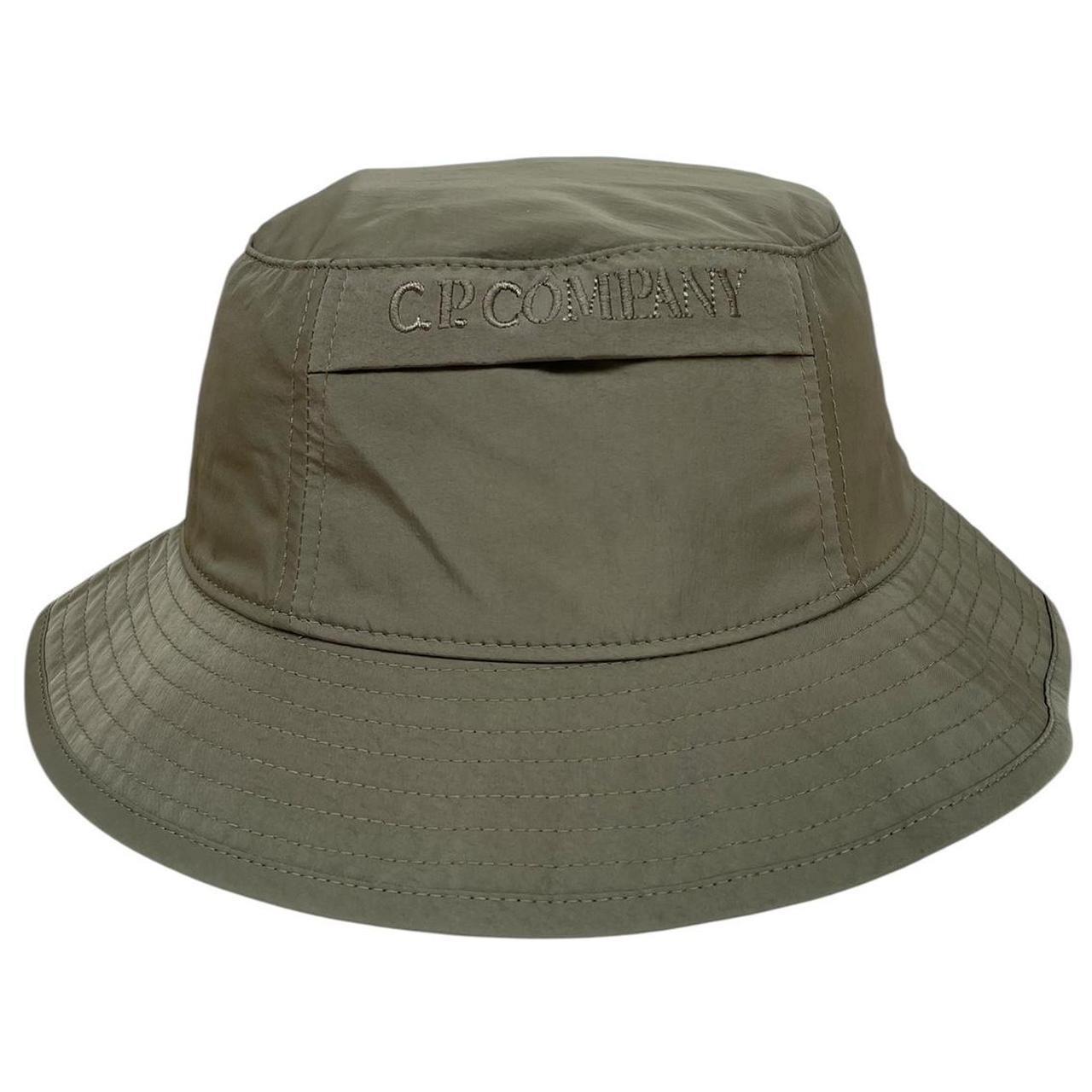 CP Company green bucket hat embroidered logo, made from Chrome-R nylon material.