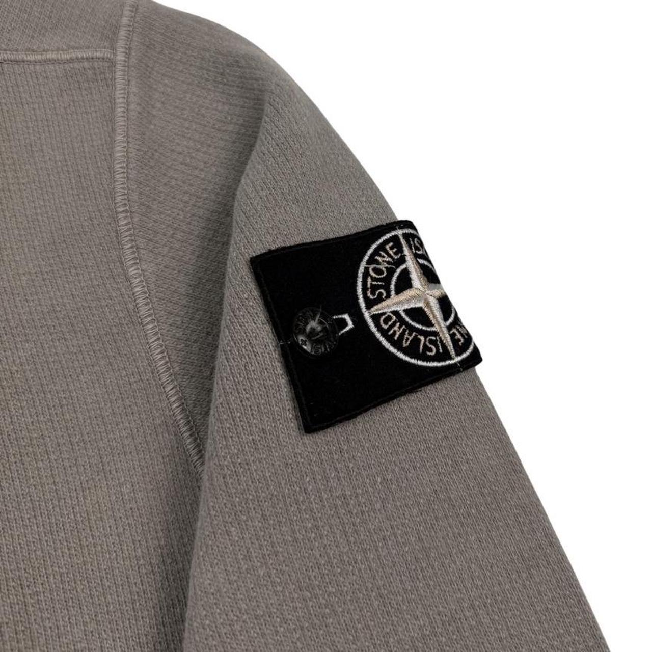 Stone Island khaki brown sweatshirt with logo patch and closed loop design.