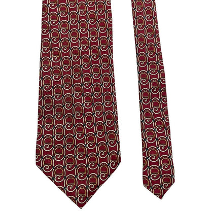 Gucci burgundy silk tie with vintage pattern and signature logo detail.