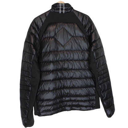 Canada Goose black down jacket with full zip and logo patch on sleeve.