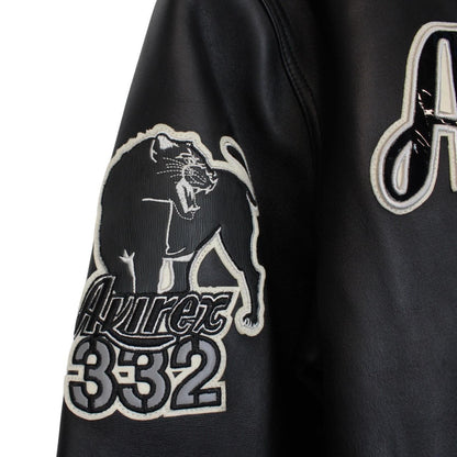 Avirex black leather jacket with Tuskegee Aces logo and full zip design.