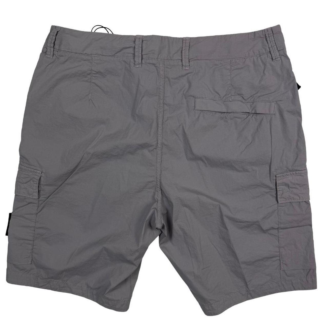 Stone Island grey cargo shorts with logo patch and multiple pockets in cotton material.