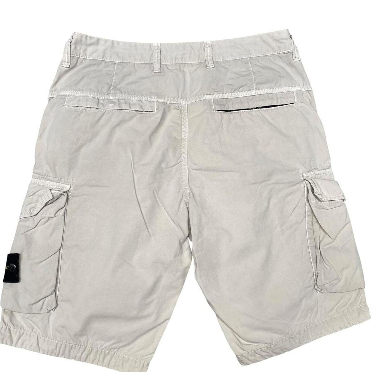 Stone Island beige cargo shorts with logo patch and cotton material.
