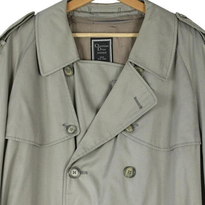Christian Dior grey double-breasted trench coat with removable wool lining and belted waist.