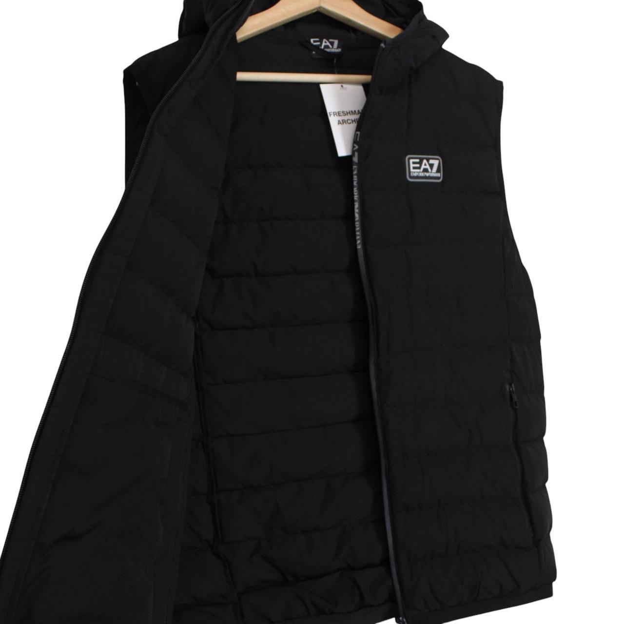 Emporio Armani black quilted hooded gilet with logo detail and zip pockets.