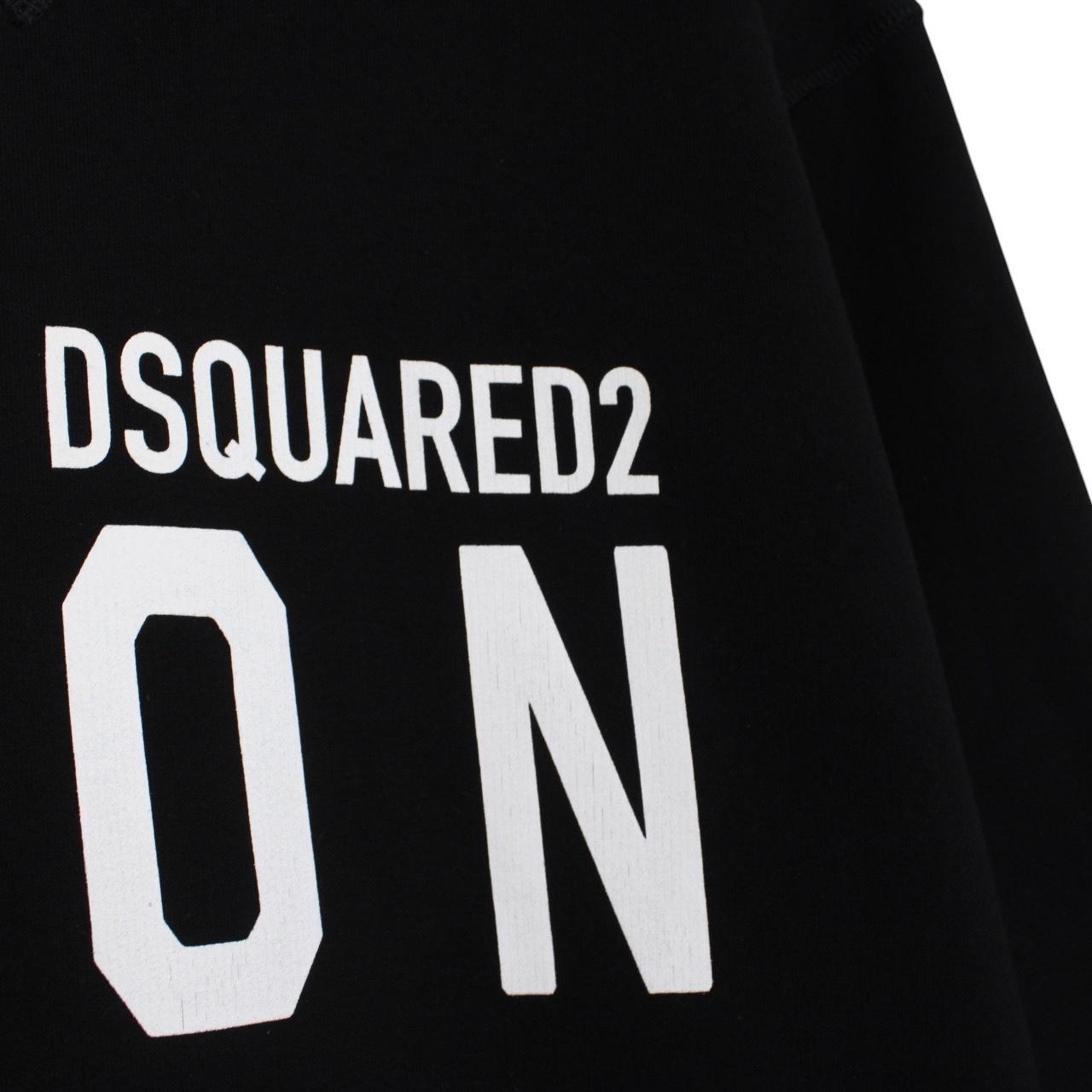 Dsquared2 black hoodie with white logo print and minor wear details.