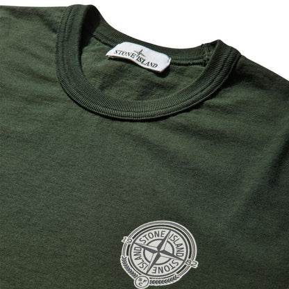 Stone Island green pocket t-shirt with embroidered crest and New Balance logo.