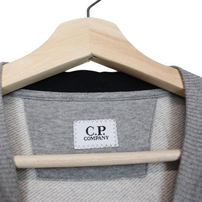 CP Company grey sweatshirt with lens detail and cotton material.