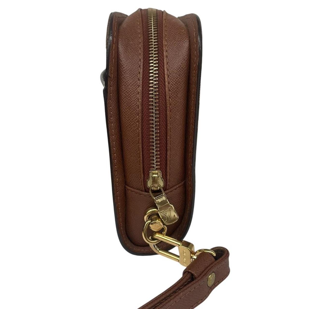 Louis Vuitton brown and tan monogram Orsay clutch bag with iconic logo pattern.
