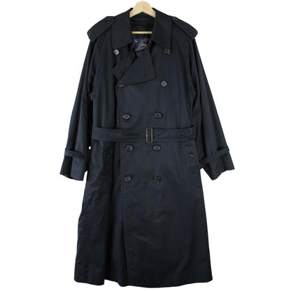 Burberry navy blue belted double breasted trench coat with iconic check lining.