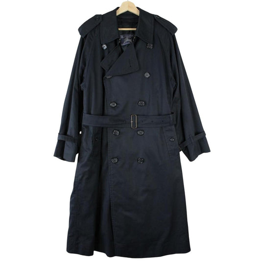 Burberry navy blue belted double breasted trench coat with iconic check lining.