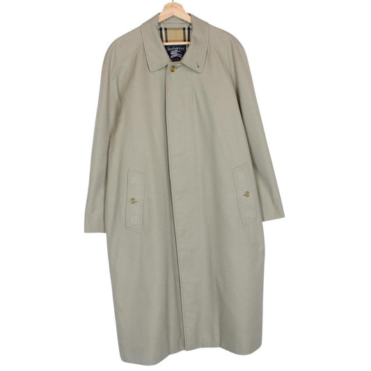 Burberry khaki green trench coat featuring Nova Check pattern and single breasted design.