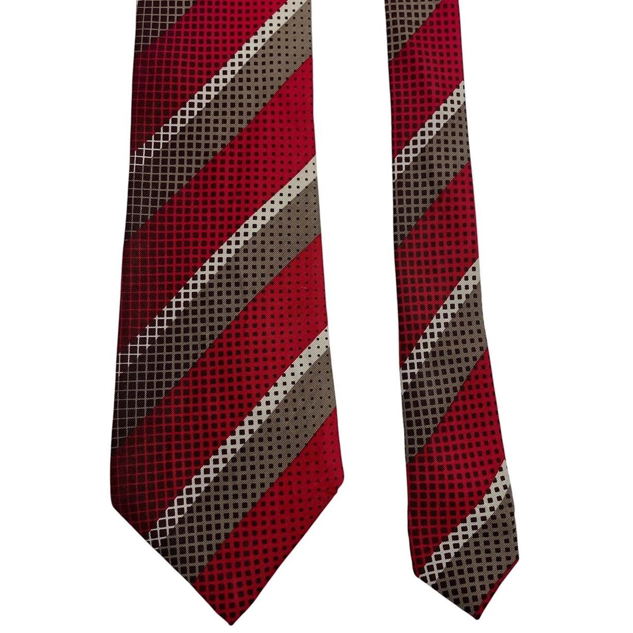 DKNY red silk tie with vintage stripes and logo detail.
