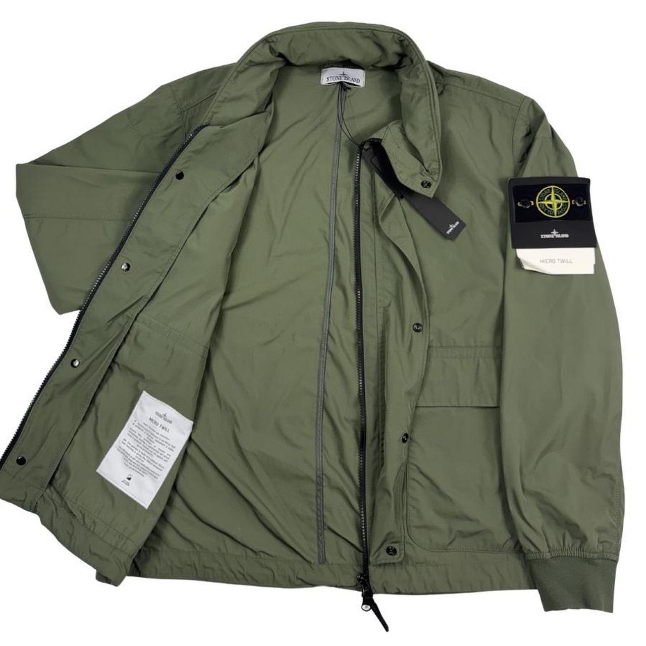 Stone Island green full zip micro twill jacket with removable woven brand patch.