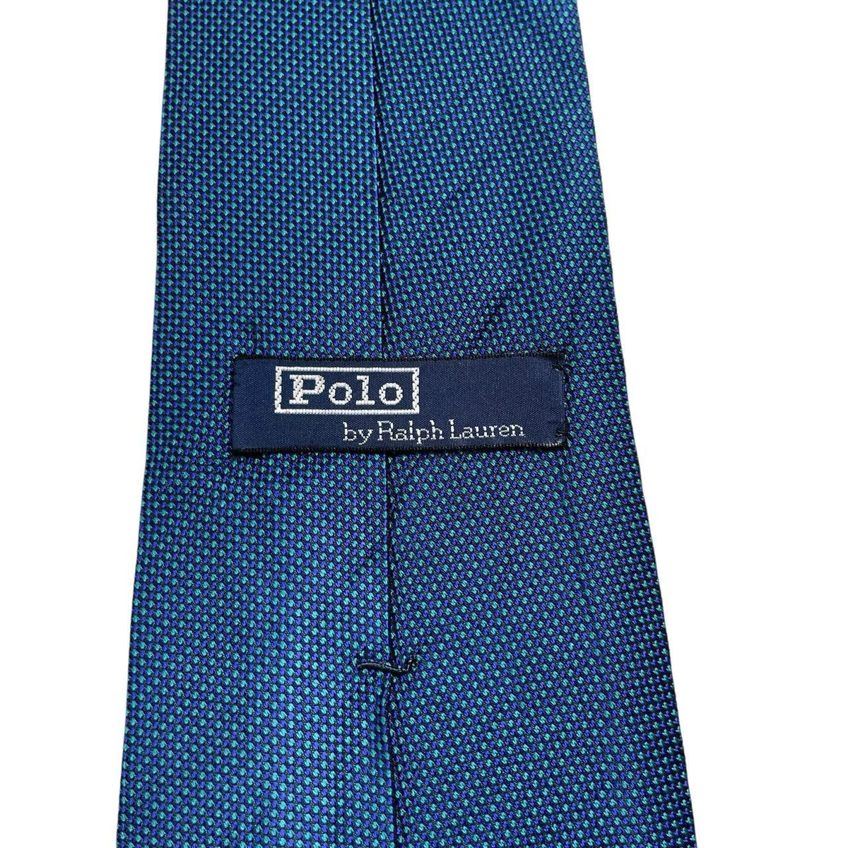 Polo Ralph Lauren blue silk tie with classic logo and smooth texture.