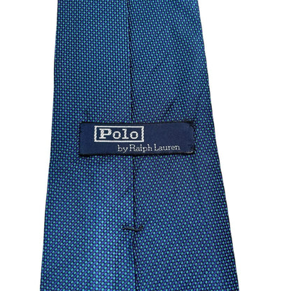 Polo Ralph Lauren blue silk tie with classic logo and smooth texture.