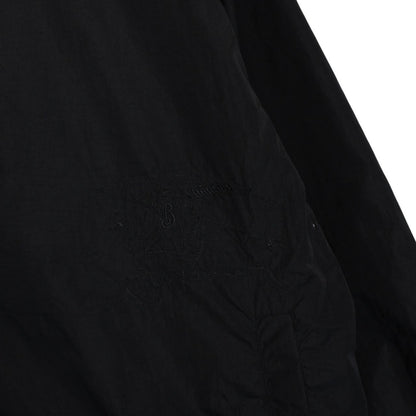 Burberry reversible jacket in dark grey and black with Nova Check pattern and full zip.