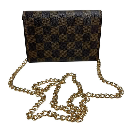 Louis Vuitton gold crossbody wallet Damier Ebene canvas with removable strap and logo.