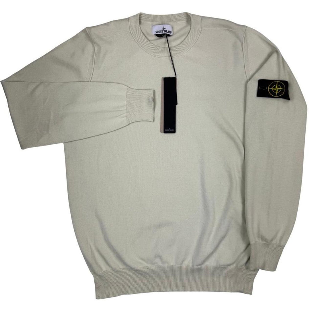 Stone Island beige knit jumper made from organic cotton with logo badge detail.