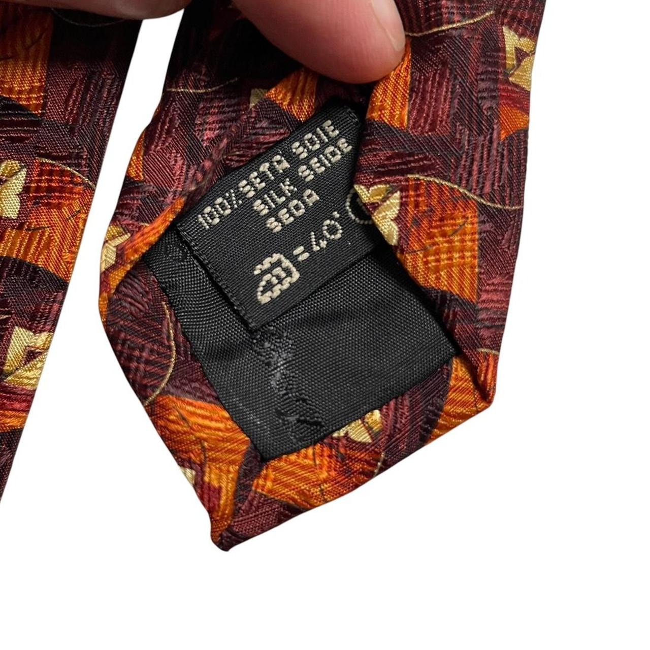 Ermenegildo Zegna brown and orange silk tie with abstract print design.