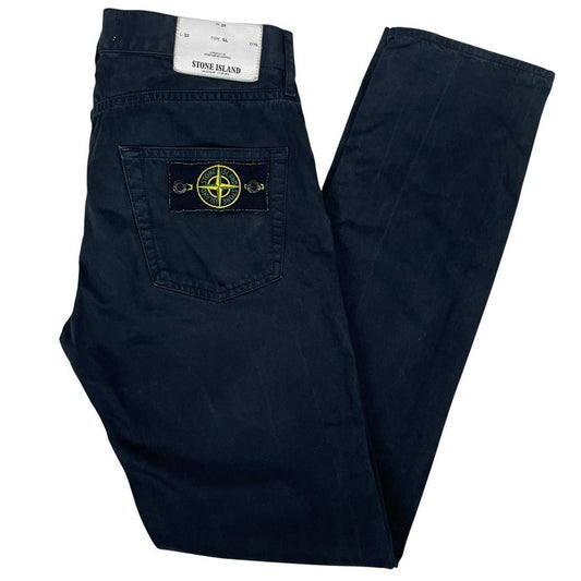 Stone Island black slim fit cotton trousers with iconic compass logo patch.