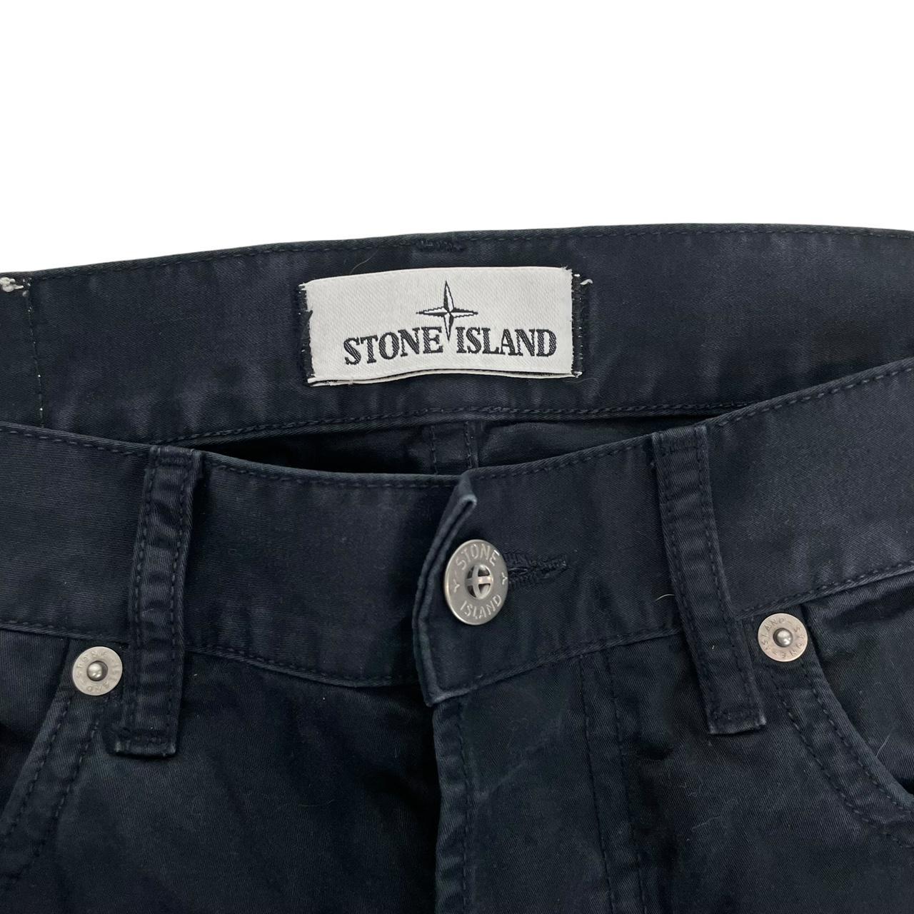 Stone Island black slim fit cotton trousers with iconic compass logo patch.