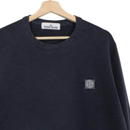 Stone Island navy blue cotton sweatshirt with logo patch and small sleeve repair.