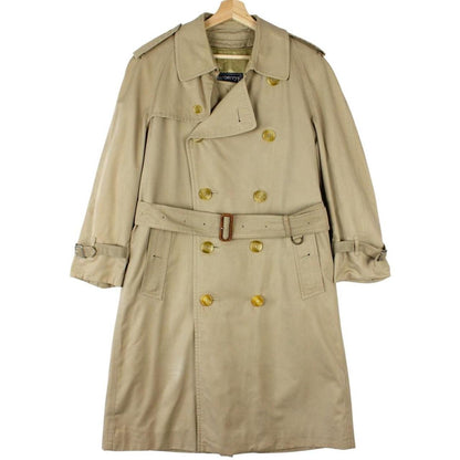 Burberry beige trench coat with Nova Check pattern, double-breasted and belted design.
