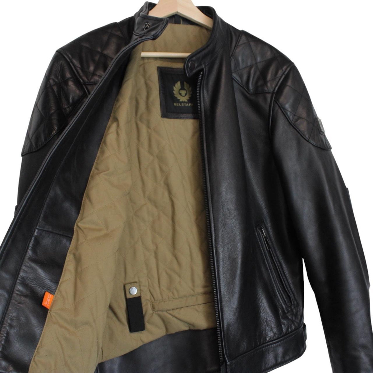 Belstaff black leather jacket with full zip and classic logo detailing.