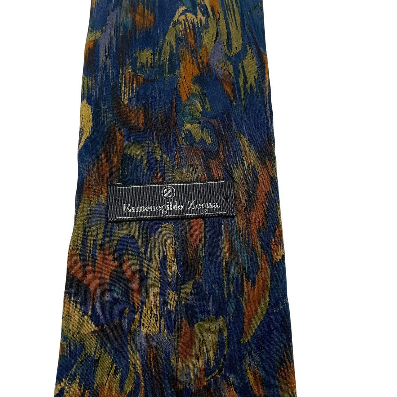 Ermenegildo Zegna multicoloured silk tie with abstract print design and smooth texture.