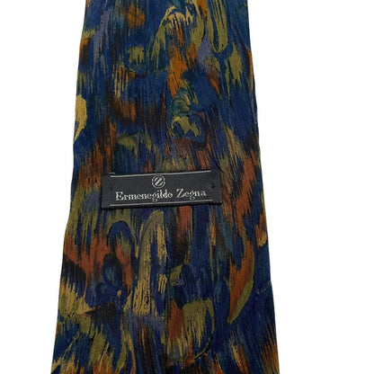 Ermenegildo Zegna multicoloured silk tie with abstract print design and smooth texture.