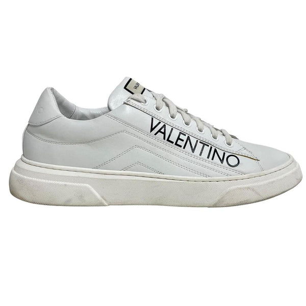 Valentino black and white trainers calfskin leather with logo detail and scuffed soles.