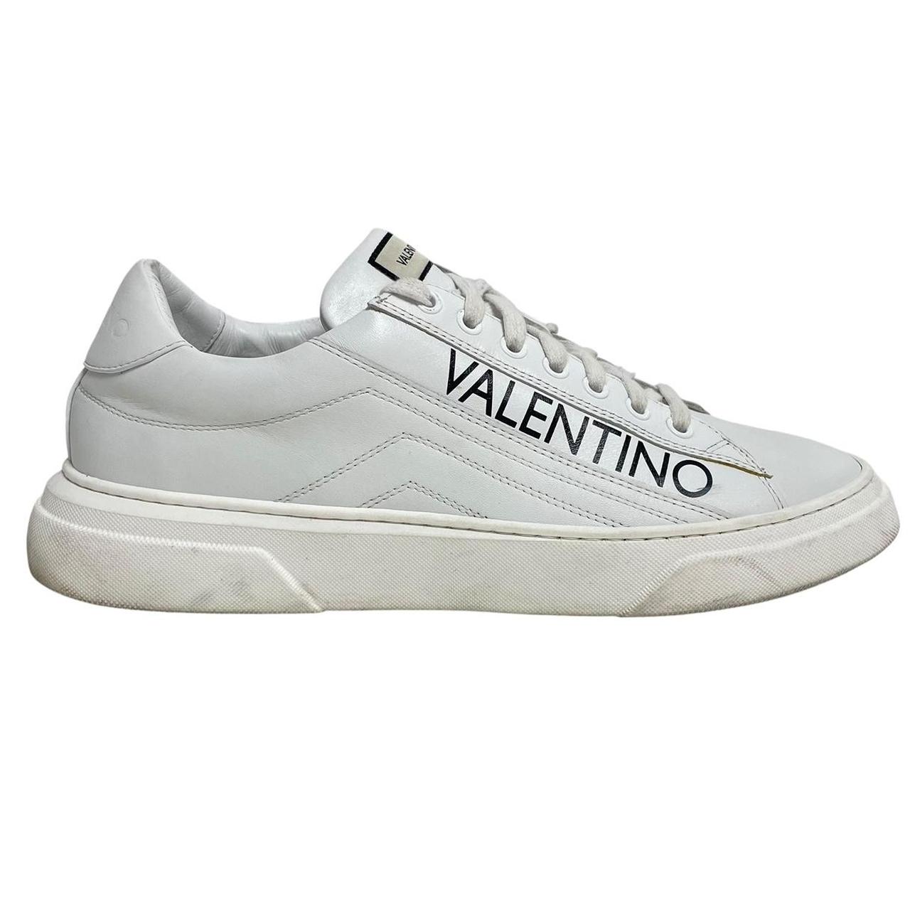 Valentino black and white trainers calfskin leather with logo detail and scuffed soles.