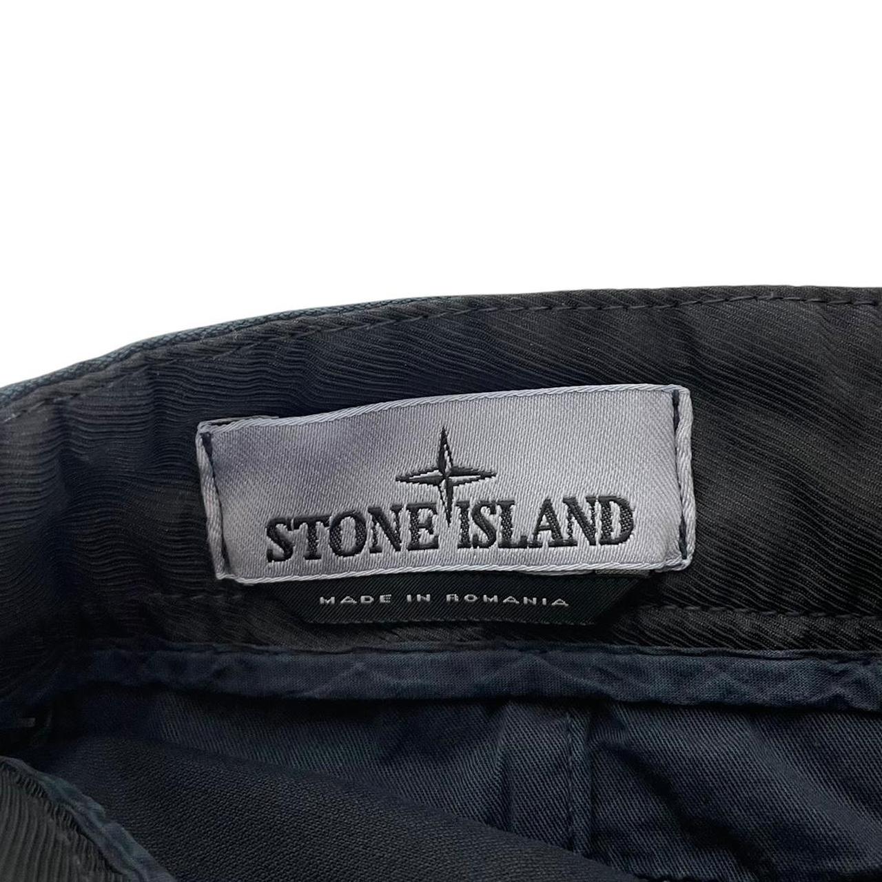 Stone Island navy blue skinny fit cargo trousers with logo patch and pockets.