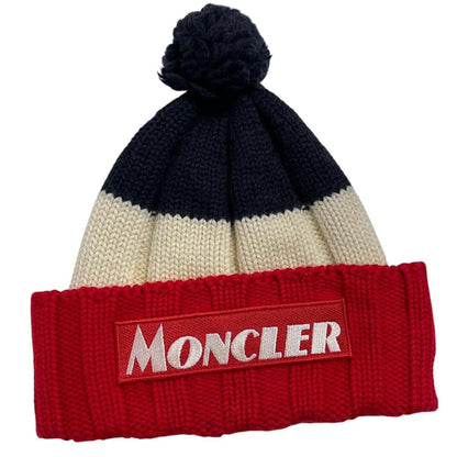 Moncler cream beanie hat with colour block design and embroidered logo.