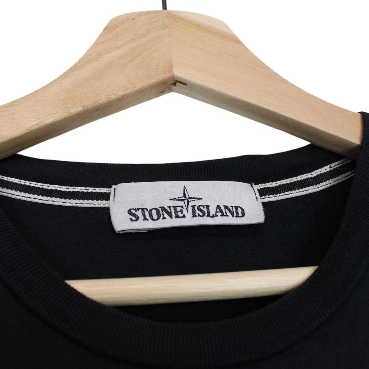 Stone Island black short sleeve cotton t-shirt with logo patch on sleeve.