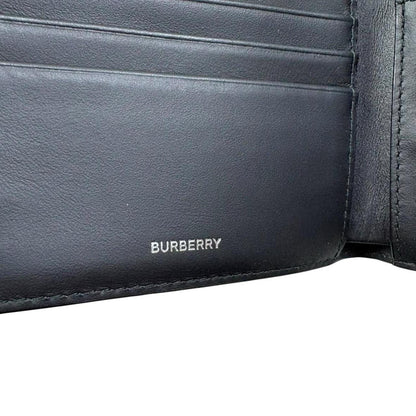 Burberry bifold wallet tan brown Nova Check pattern with logo detail.