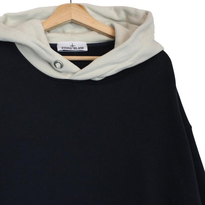 Stone Island beige and navy blue cotton hoodie with logo patch and drawstring hood.
