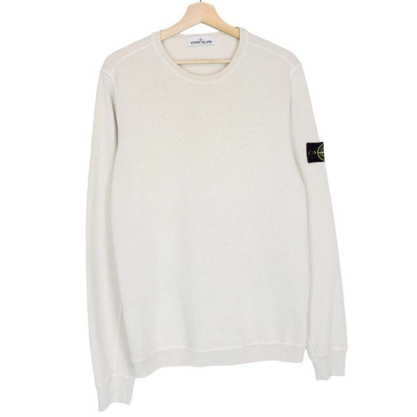 Stone Island beige cotton sweatshirt with logo patch and ribbed cuffs.