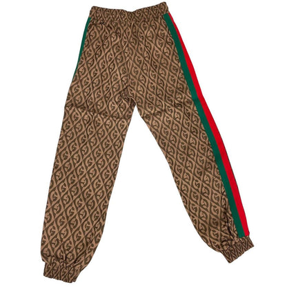 Gucci brown trousers with G rhombus jacquard pattern and soft viscose material.