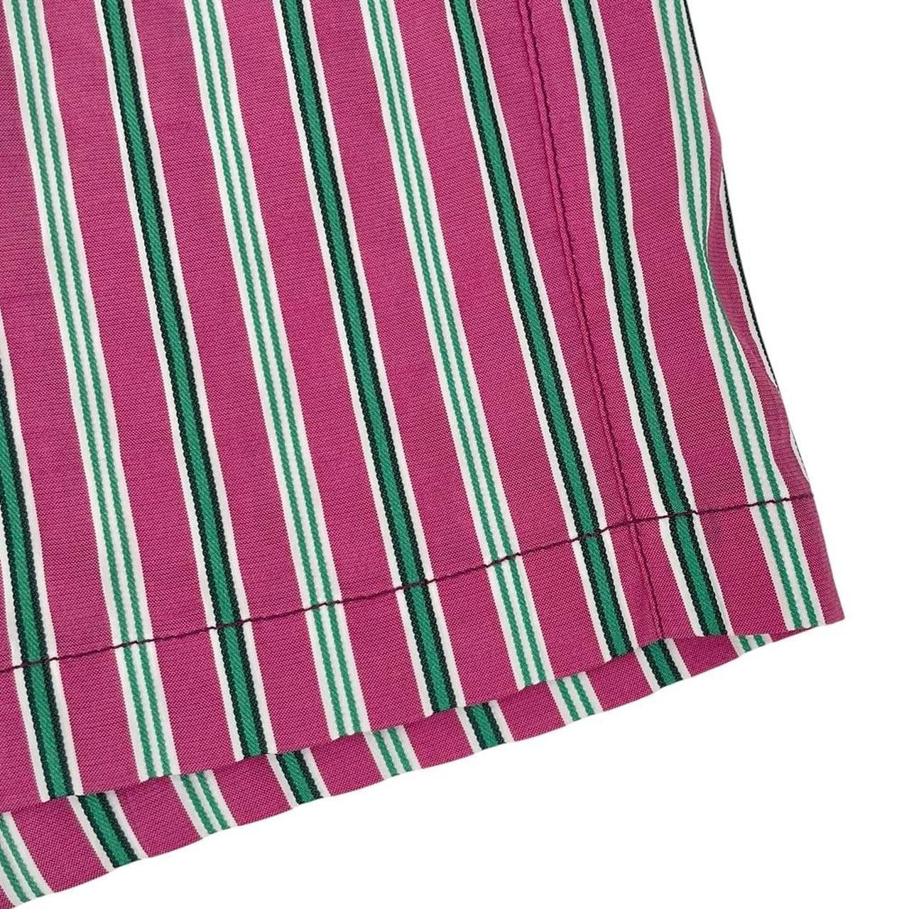 Paul Smith red swim shorts with striped pattern and cotton material.